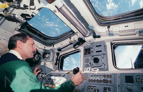 Astronaut in the space shuttle Discovery
