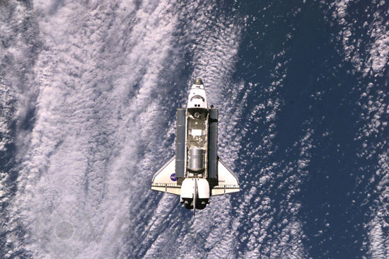 Space shuttle Endeavour is approaching ISS. 12/2001