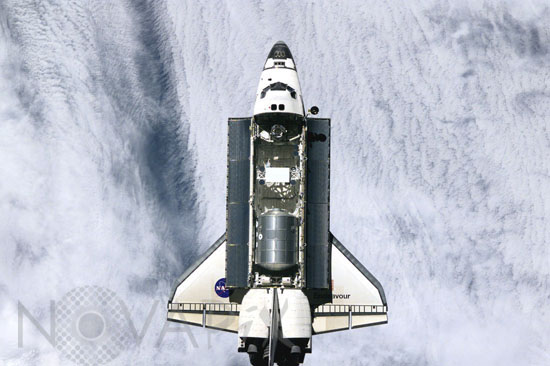 Space shuttle Endeavour is approaching ISS. 12/2001