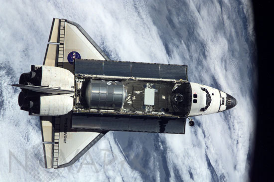 Space shuttle Endeavour is approaching ISS. 12/2001