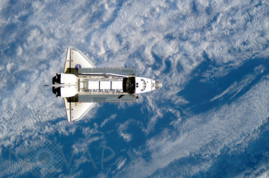 Shuttle Atlantis approaches ISS. 10/2002