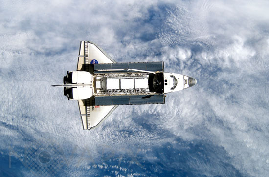 Shuttle Atlantis approaches ISS. 10/2002