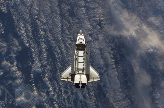 Shuttle Atlantis approaches the International Space Station 10/2002