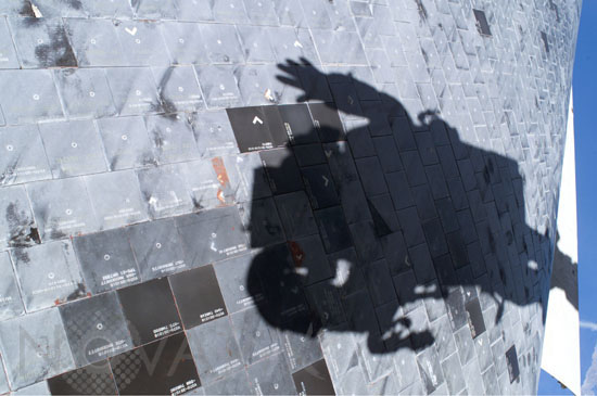 Astronaut's shadow on space shuttle Discovery. 08/2005
