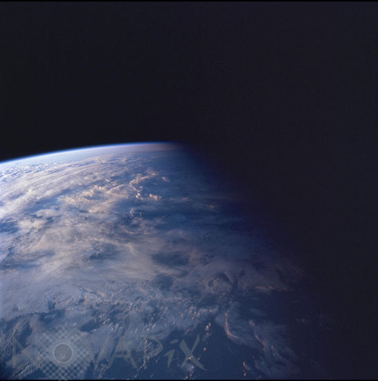 Clouds and earth terminator seen from the space shuttle Discovery.