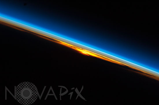 Earth's atmosphere and rising sun 09/2008