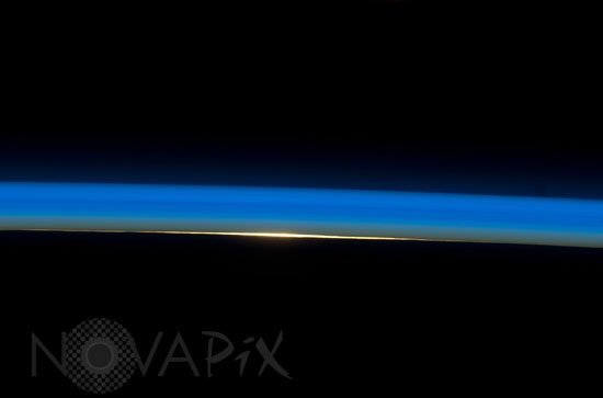 Earth's atmosphere and rising sun 07/2009