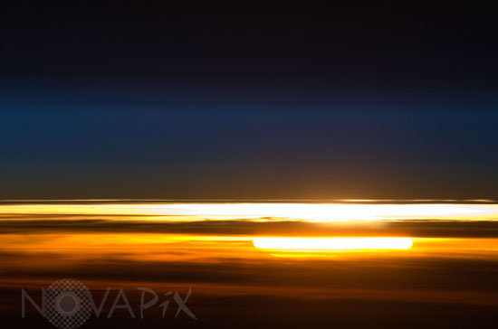 Earth's atmosphere and setting sun 01/2010
