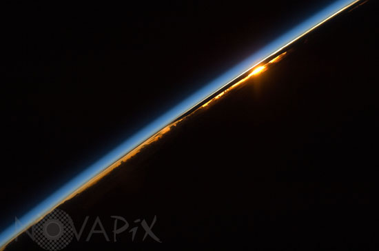 Earth's atmosphere and setting sun