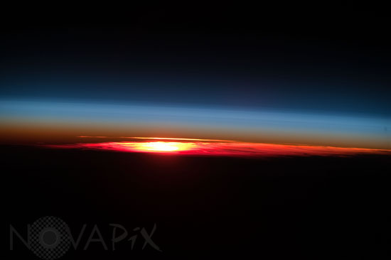 Earth's atmosphere and setting sun