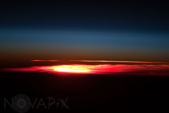 Earth's atmosphere and setting sun