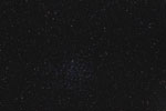 Amas d'étoiles M46 et nébuleuse planétaire NGC 2438 dans la Poupe