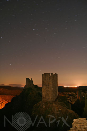 Star trails over the castles of Lastours