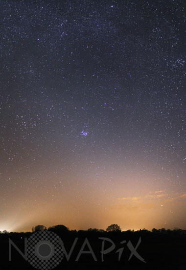 The Pleiades cluster with zodiacal light