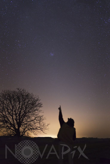 The Pleiades cluster with zodiacal light