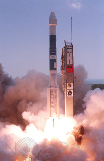 Delta II rocket lifts off carrying Genesis spacecraft. 8/08/2001