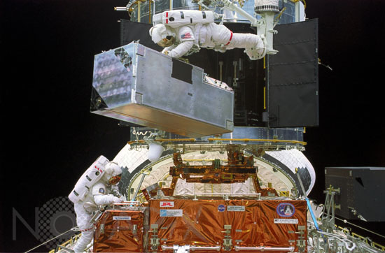 Hubble space telescope first repair: astronauts with COSTAR
